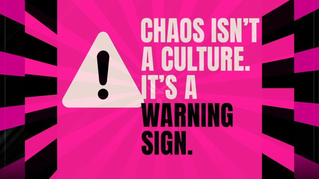 Flat graphic with bold typography stating 'Chaos Isn’t a Culture — It’s a Warning Sign' in black and hot pink on a dark background